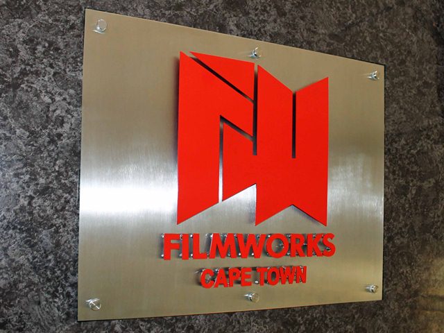 Stainless steel sign with raised lettering